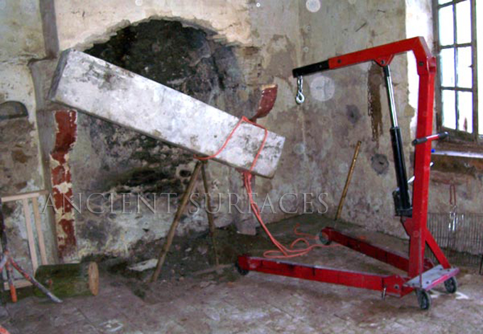 Antique fireplace mantel getting reclaimed in Corsica