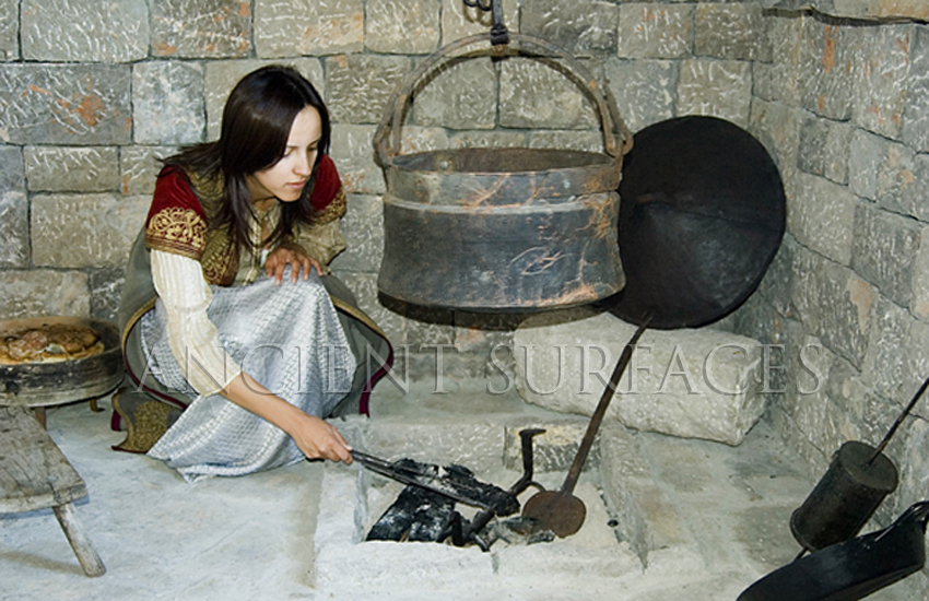 Reenactment in utilization of ancient cooking tools and techniques