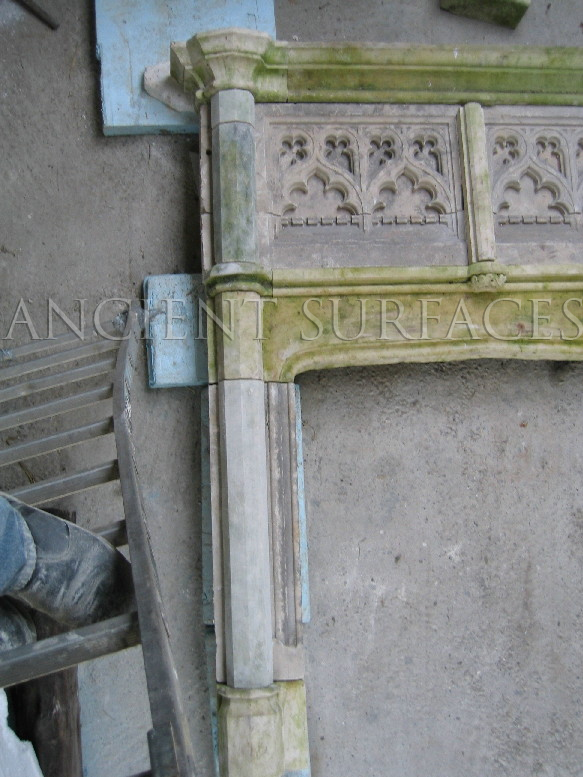 Reclaimed English Gothic Revival stone fireplace mantle