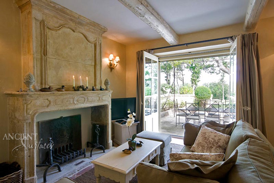 A reclaimed French Fireplace Mantle from the South of France. Reclaimed and sold by Ancient Surfaces.