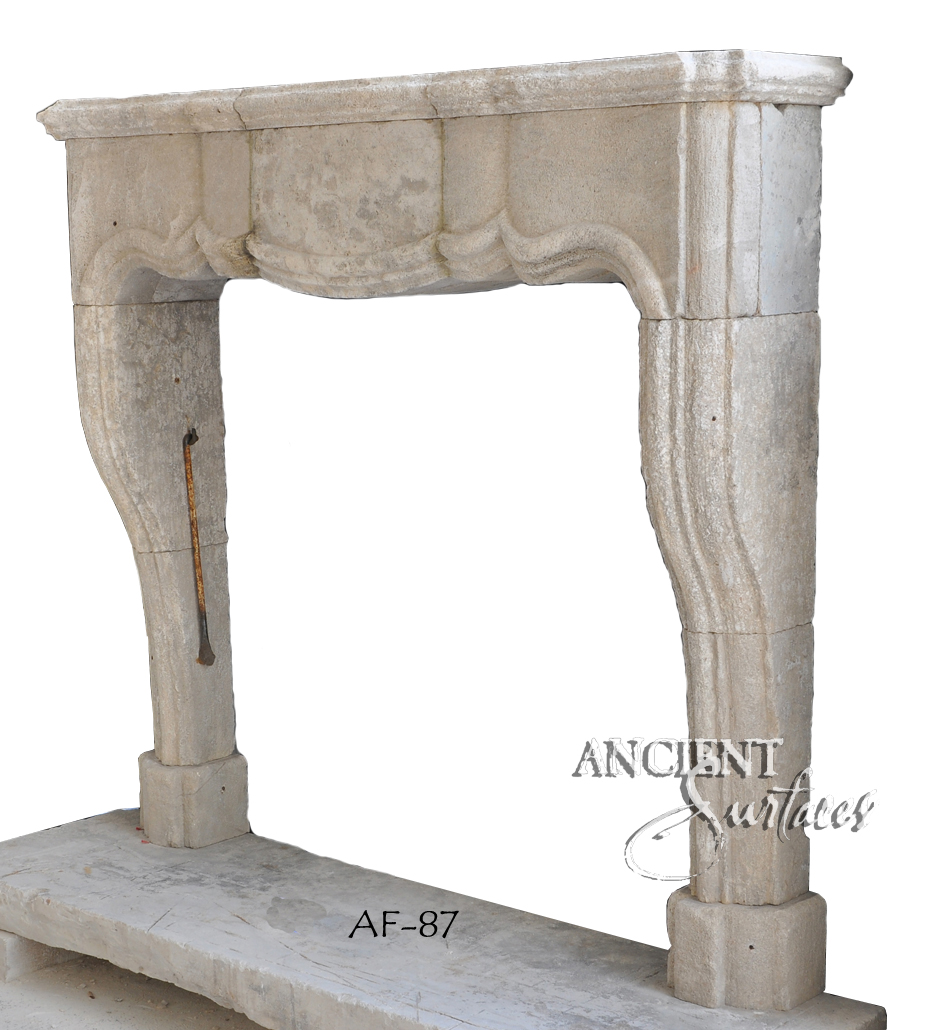 Antique stone fireplace by Ancient Surfaces. Ideas and examples from our upcoming online catalog.   http://www.ancientsurfaces.com/Antique-Fireplaces.html