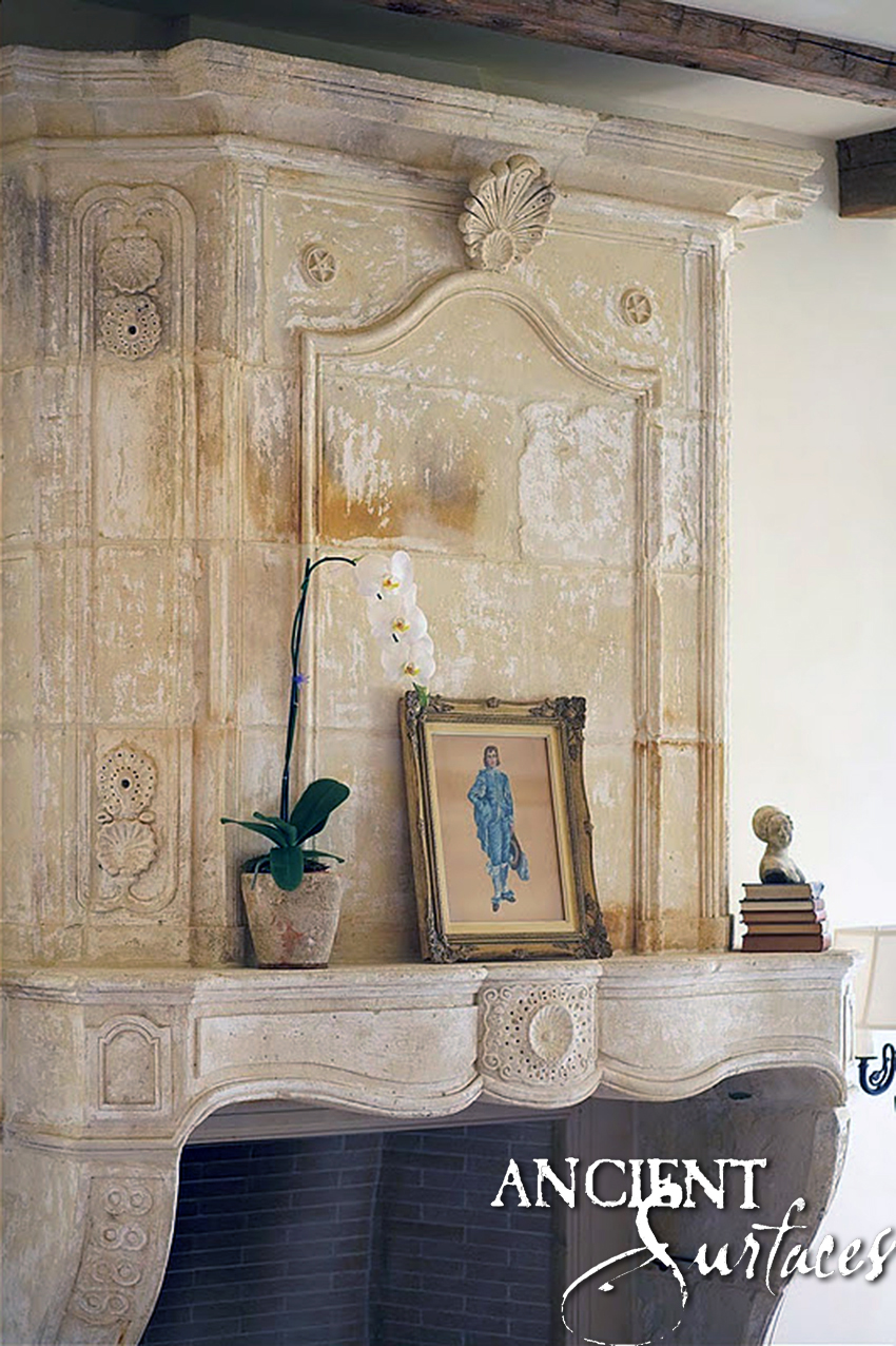 Antique Reclaimed French Fireplace with a decorative over mantle