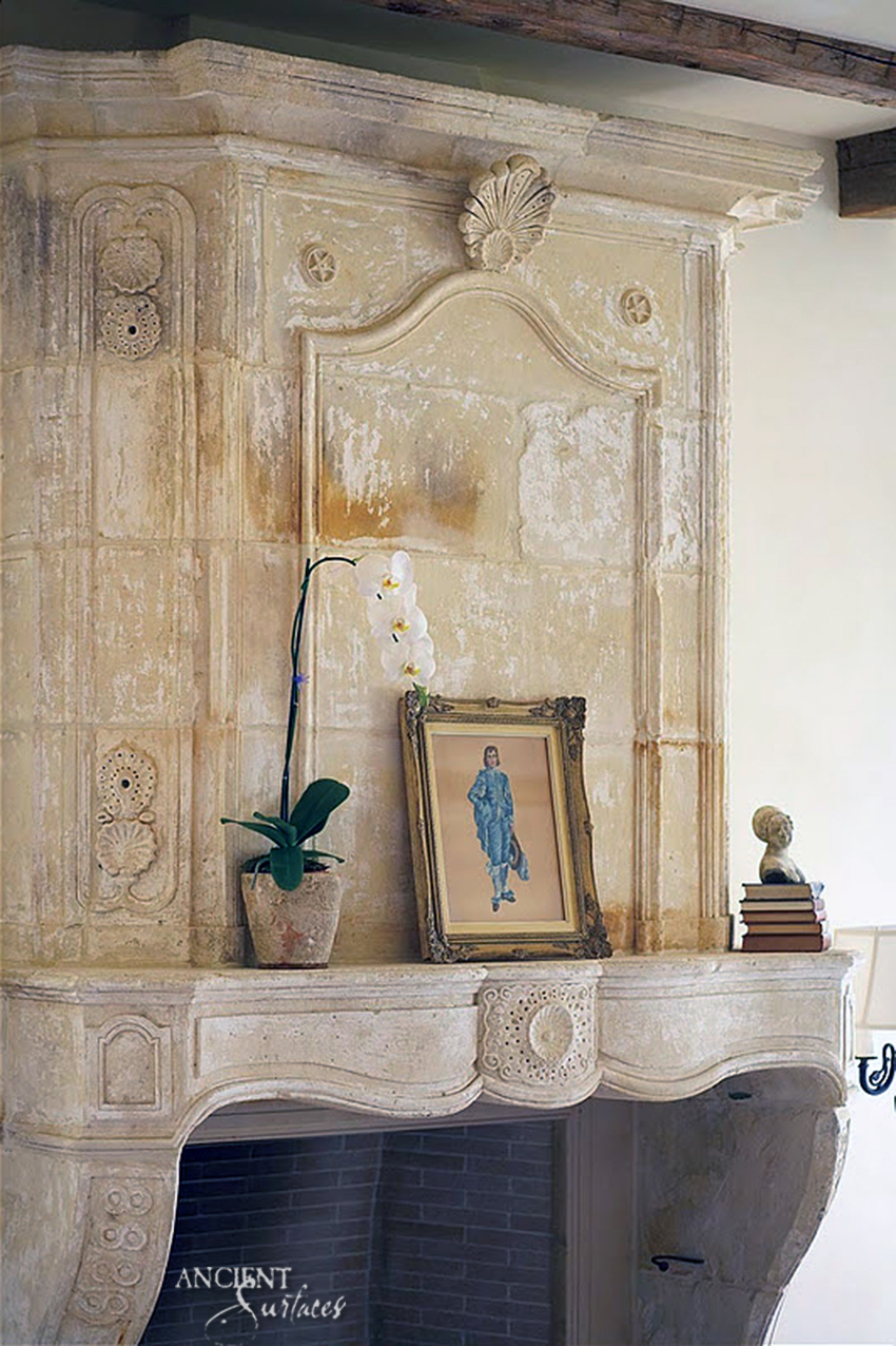 Antique-Reclaimed-French-Fireplace-with-a-decorative-over-mantle