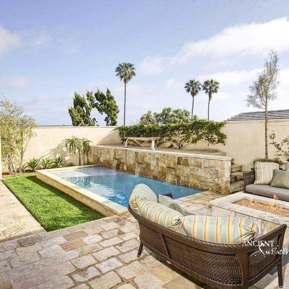english-style-wall-cascading-fountain-with-antique-biblical-stone-and-a-reclaimed-stone-fire-pit