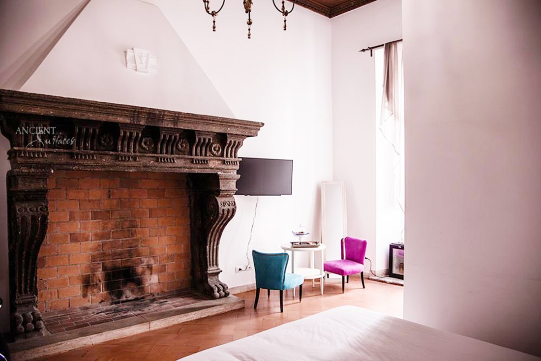 antique limestone fireplace