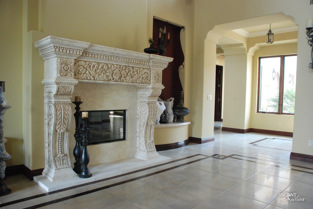 Ancient surfaces
Antique limestone fireplace
stone mantle 
Antique custom carved limestone mantle
Haut-relief carving 
