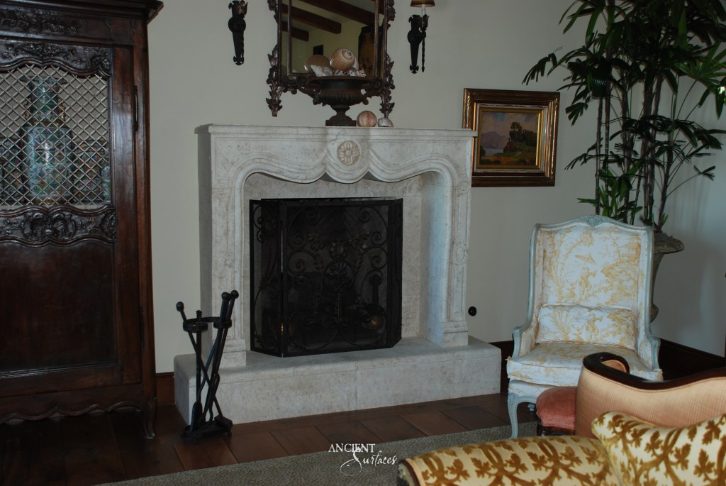 Ancient surfaces
Antique limestone fireplace
stone mantle 
Antique custom carved limestone mantle
Haut-relief carving 
