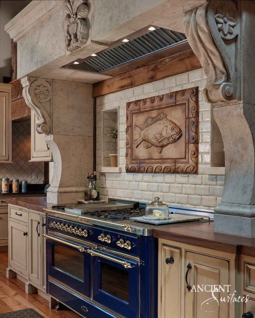 Antique limestone kitchen hood
Reclaimed limesotne kitchen hood
Old world limestone hood
Ancient Surfaces
Timeless kitchen charm
Rustic beauty in kitchens
Historical essence in design
Elegant kitchen ventilation
Modern features in antique hoods
Custom-designed limestone hoods
Kitchen design focal point
High-quality craftsmanship in decor
Versatile kitchen hood designs
Island and wall-mounted hoods
Kitchen aesthetic enhancement
Culinary space transformation
Commitment to quality and elegance